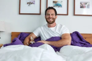 he makes millions from the comfort of his bed.
